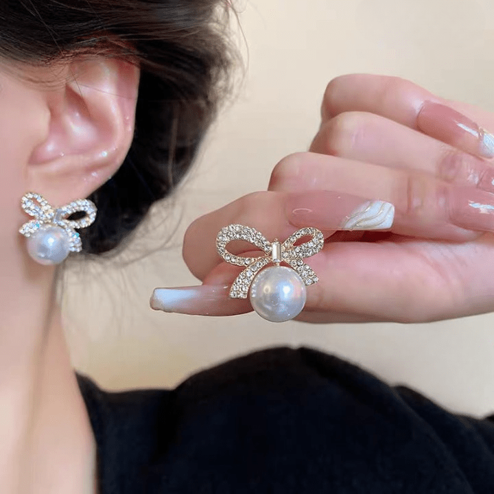 Bow Knot Pearl Earrings with Zircon – Korean Style (PJX - 113) - Buyora onlineBow Knot Pearl Earrings with Zircon – Korean Style (PJX - 113)Buyora onlineBuyora onlineBow Knot Pearl Earrings with Zircon – Korean Style (PJX - 113)