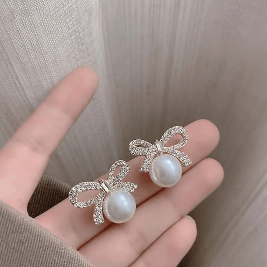 Bow Knot Pearl Earrings with Zircon – Korean Style (PJX - 113) - Buyora onlineBow Knot Pearl Earrings with Zircon – Korean Style (PJX - 113)Buyora onlineBuyora onlineBow Knot Pearl Earrings with Zircon – Korean Style (PJX - 113)